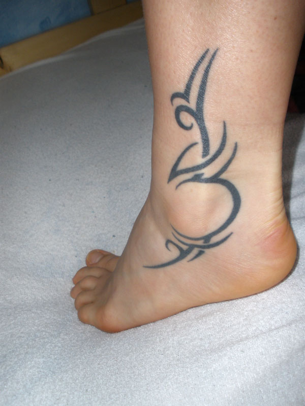 Szavazz 2009 legjobb lábtetoválására 12 petoedina tattoo 135